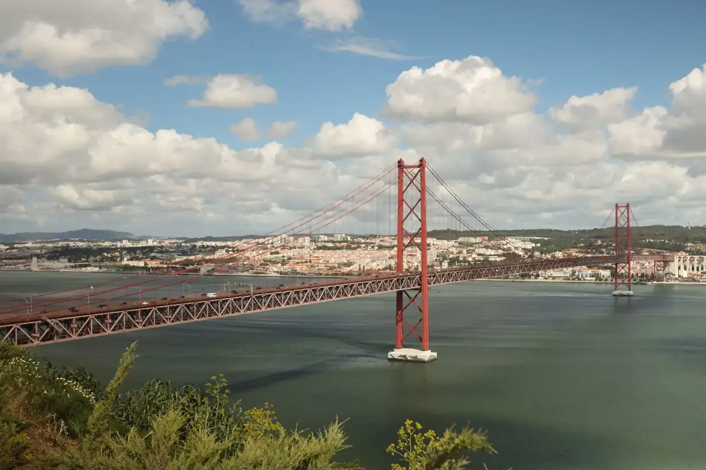 Scenic view of the 25 de Abril Bridge spanning the Tagus River in Lisbon, Portugal.
